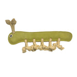 A green Gerti the Grub - pear by Georgie Paws with an elongated body and round head. It has a single white eye with a black pupil, and its multiple legs are made from knotted, biodegradable coconut fiber. The toy has a simple, handmade appearance and is photographed against a plain white background.