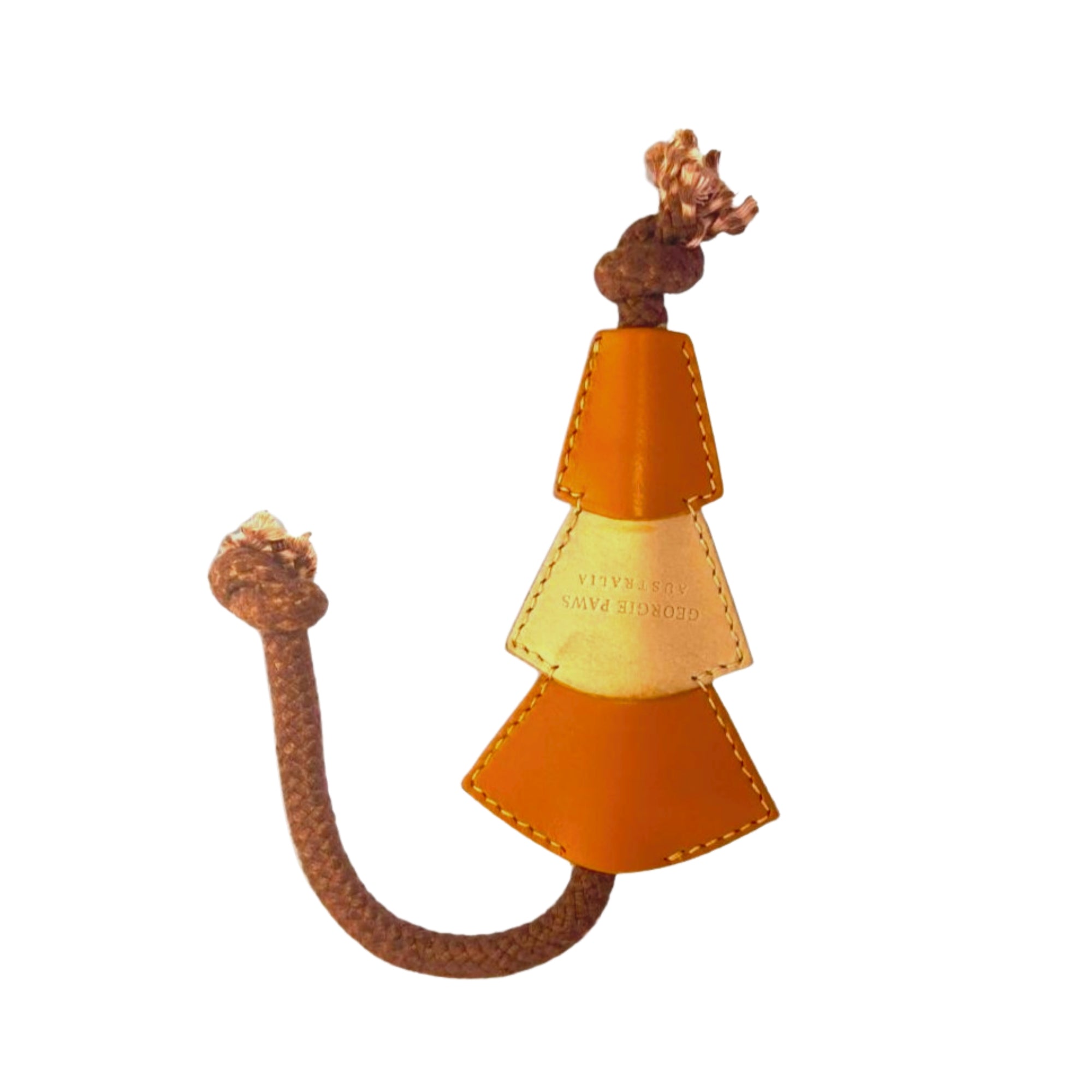 A whimsical coat hook shaped like an upside-down Bush Christmas Chew Toy - ochre, featuring a textured Veg-Tanned Buffalo Leather handle and three golden orange, triangular sections with embossed letters. A decorative lion's head tops the bottle, adding a unique accent. from Georgie Paws