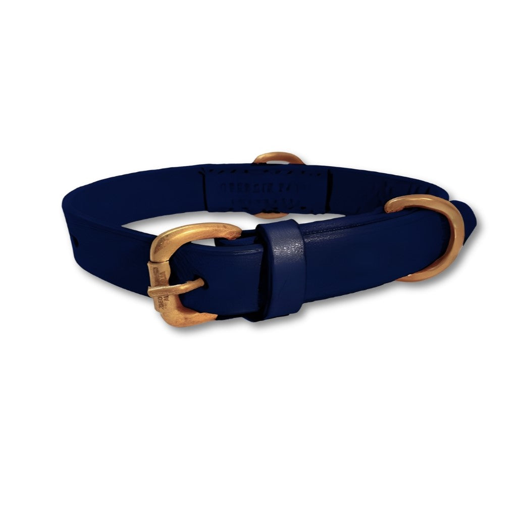 A Bald Collar Navy belt crafted from buffalo leather with a gold-tone buckle, featuring a textured design, isolated on a white background by Georgie Paws.