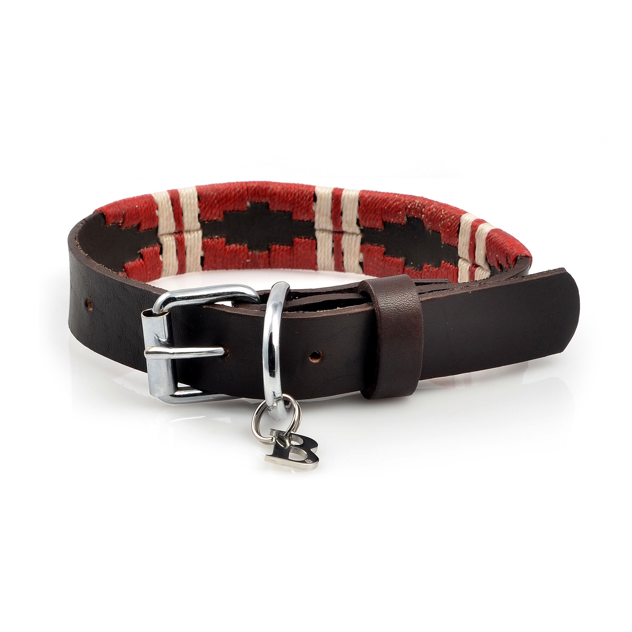 The Georgie Paws Initials - Collar Charms features a dark brown leather dog collar with a stainless steel “B” charm, silver buckle, and red-and-cream stitched geometric patterns, coiled on a white background—perfect as a dog gift.