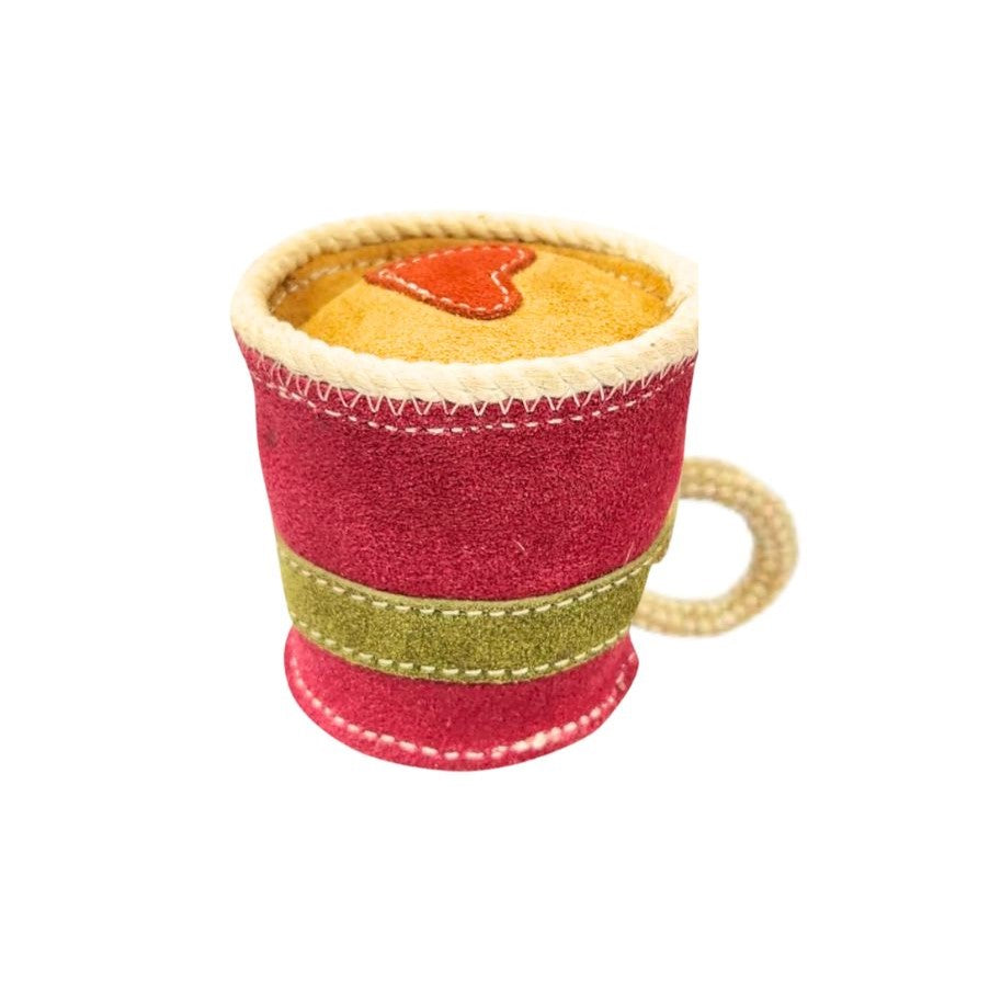 The Baby Chino Toy by Georgie Paws is a vibrant mug design made of felt and stitching. It's mainly red with a green stripe, features a cream handle, and has latte art detailing with a stitched red heart. Perfect as a playful accessory!.