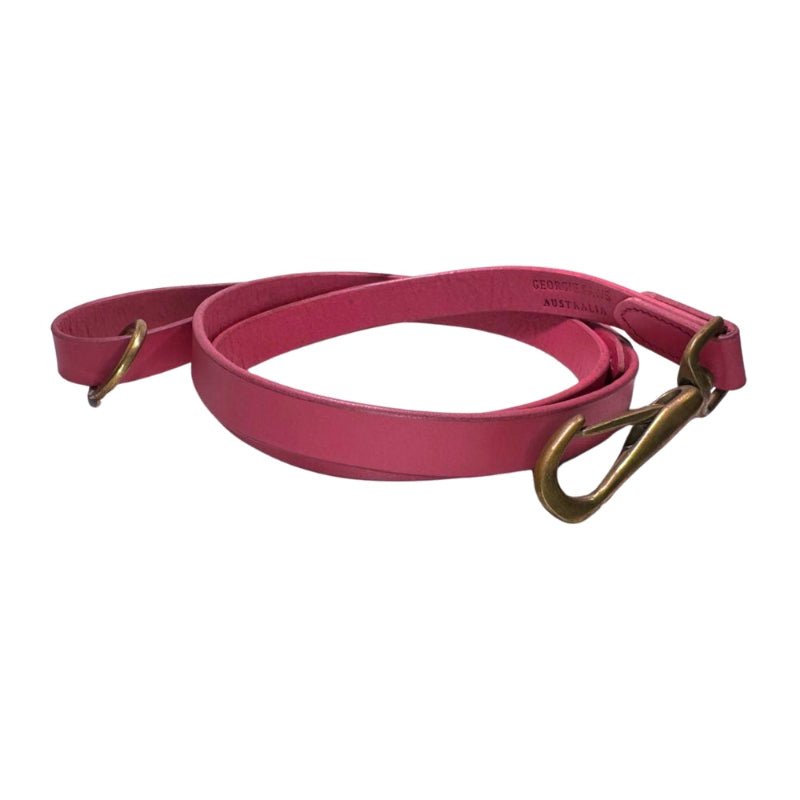 Bald Dog Lead in Hot Pink, a handmade buffalo leather dog lead with solid brass hardware by Georgie Paws