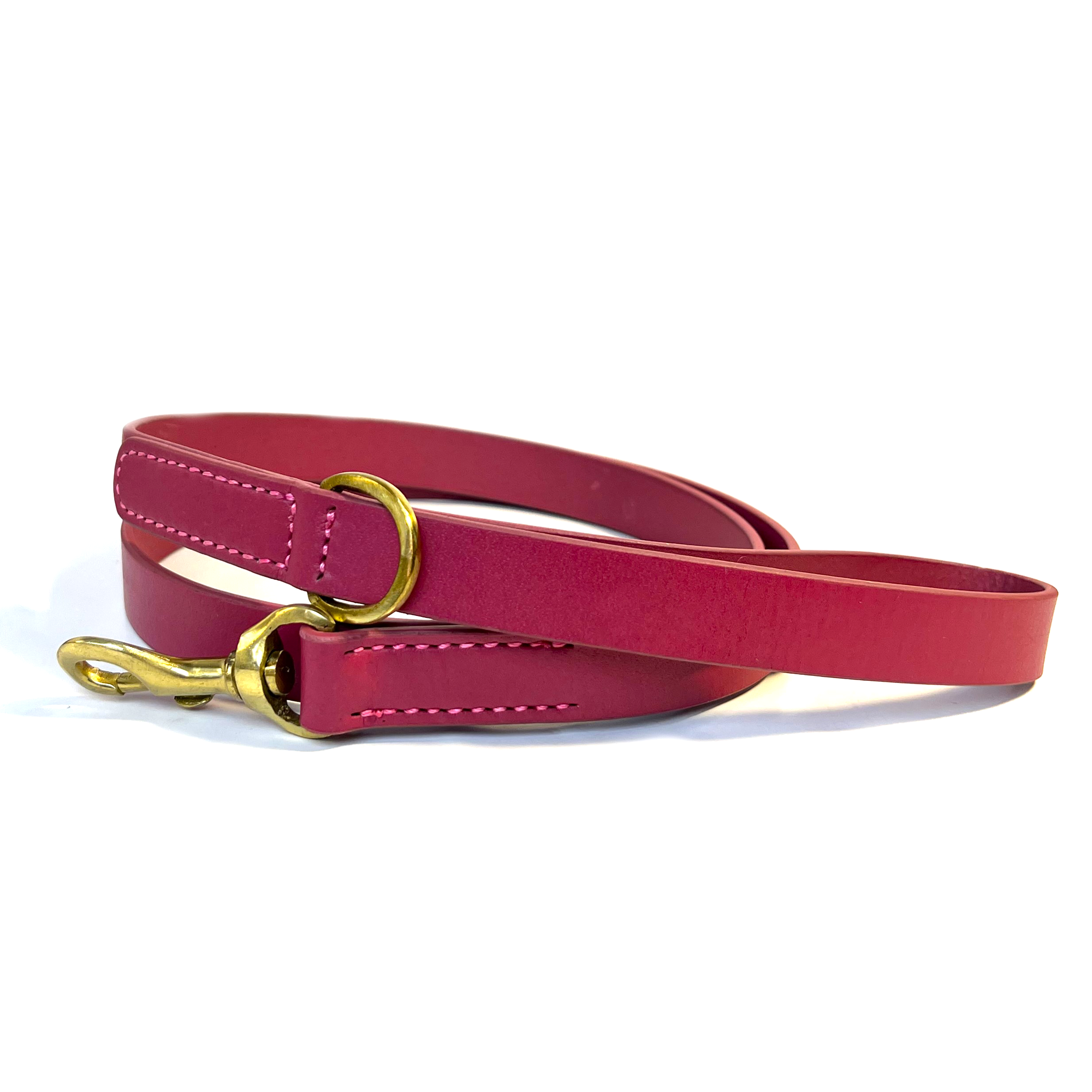 A Bald Lead Ruby dog leash in burgundy buffalo leather with a golden clasp and metal ring, showcasing a simple yet elegant design for pet owners, isolated on a white background by Georgie Paws.