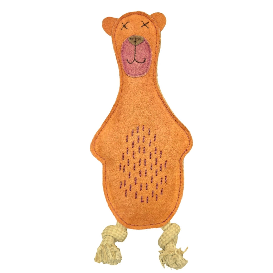 Baz the Bear - orange by Georgie Paws is an eco-friendly stuffed dog toy made of plush-textured, orange fabric. Designed in the shape of a bear, it features embroidered black X's for eyes, a pink nose, and a stitched brown smile. Its arms and legs are crafted from knotted beige rope, with brown stitch marks on the belly for fur detail.