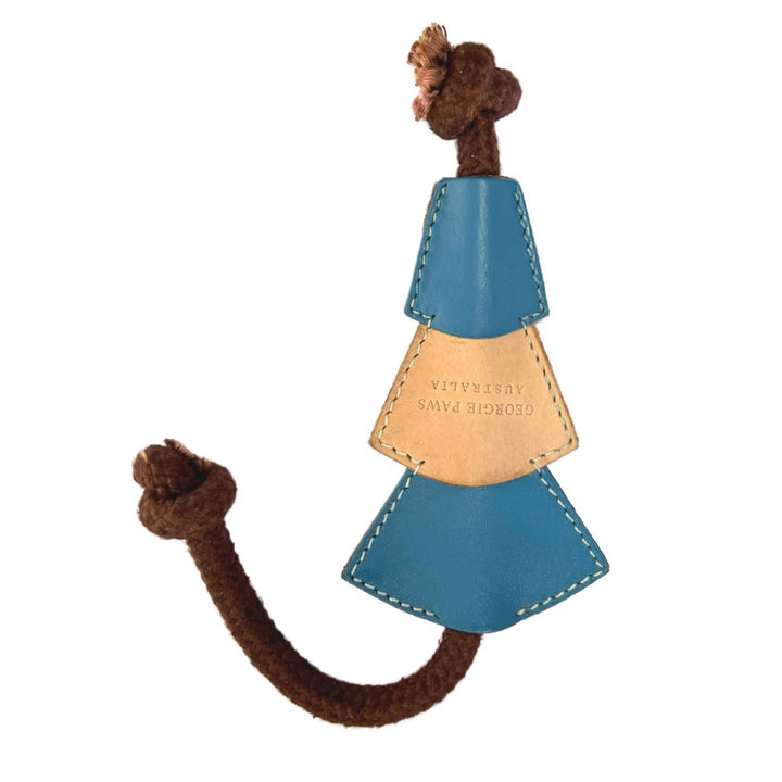 Introducing the Bush Christmas Chew Toy - Storm by Georgie Paws: a dog chew toy featuring a brown twisted rope with knots on both ends and a section of Veg-Tanned Buffalo Leather in the middle. The leather, with intricate stitching details and "GEORGIE PAWS AUSTRALIA" printed on it, keeps your furry friend entertained.