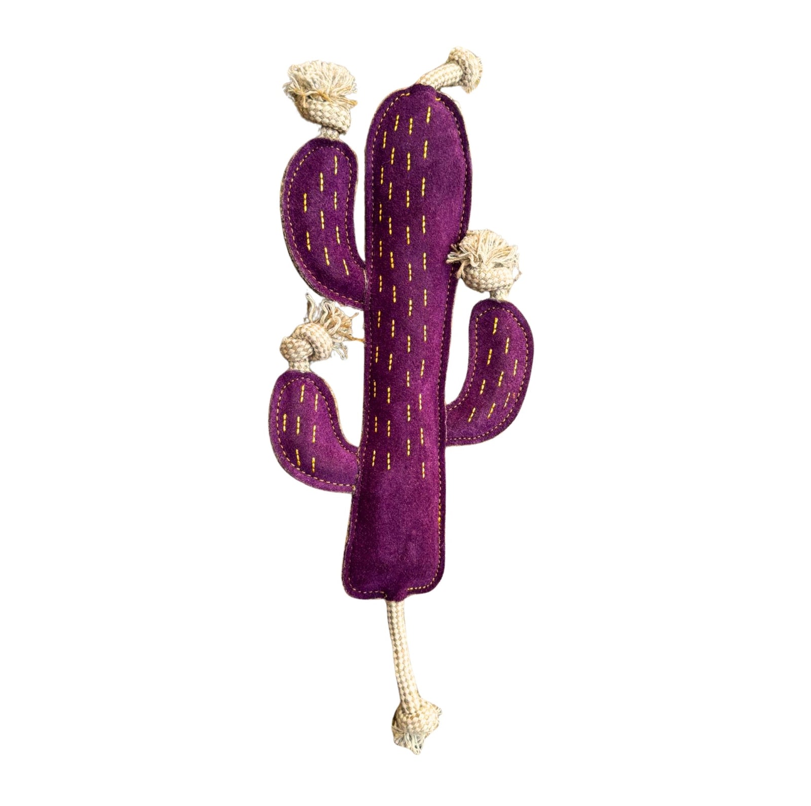 The Georgie Paws Cactus – Dog Toy is a purple, eco-friendly plush shaped like a cactus with three arms, yellow stitched lines, and beige knotted rope at the tips for a fun, durable design. Plain white background.