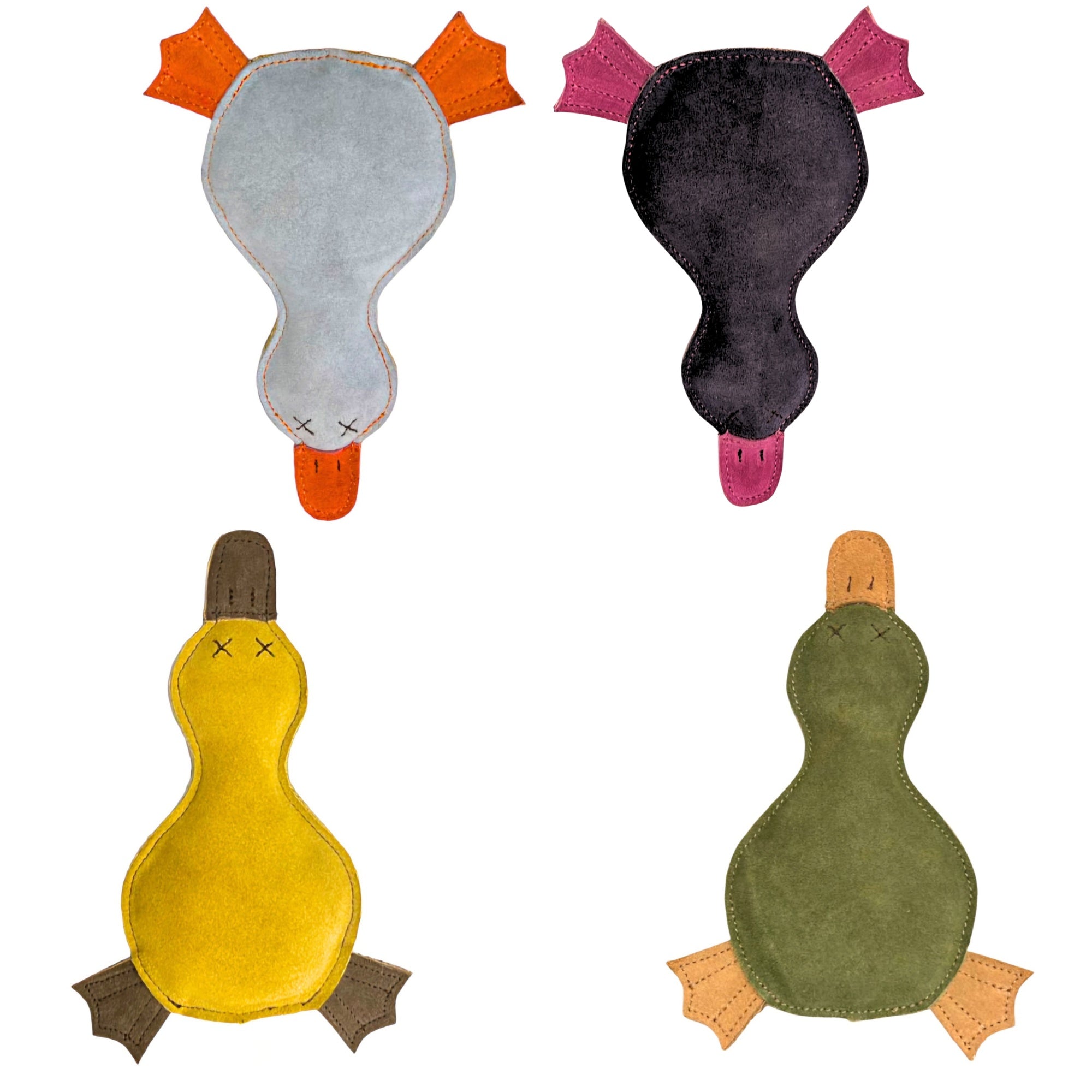 A set of four Georgie Paws plush dog toys shaped like animals, arranged in a two-by-two grid. Top left: Paul the Platypus - a light blue toy with orange feet and beak. Top right: a black toy with magenta feet and tongue. Bottom left: a yellow toy with brown feet and beak. Bottom right: a green toy with brown feet and beak, crafted from sustainable materials.