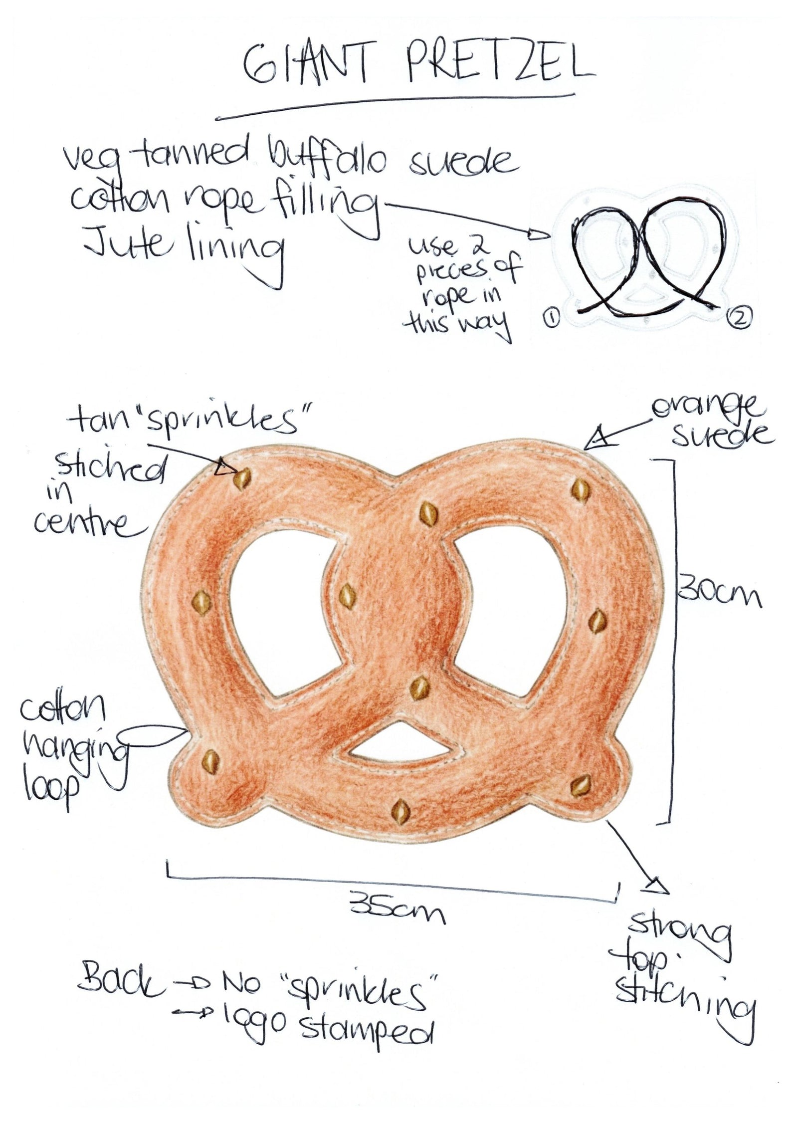 The Georgie Paws Giant Pretzel - Big Dog Toy is a hand-drawn tan suede toy with cotton rope filling, jute lining, tan "sprinkles," a cotton hanging loop, and measures 30cm tall by 25cm wide. Perfect for tug of war!.
