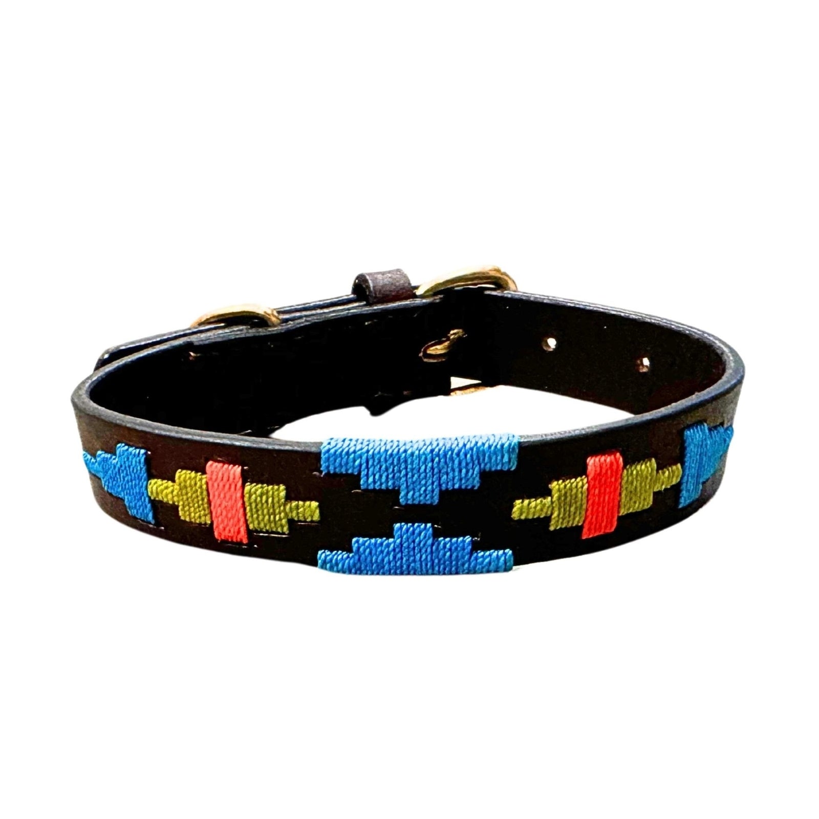 The Percy Polo Collar by Georgie Paws is crafted from vegetable tanned black buffalo leather and features blue, red, and yellow geometric embroidery with repeating zigzag and bar patterns. It includes small holes for adjustment, metallic hardware such as a buckle, and is displayed against a plain white background.
