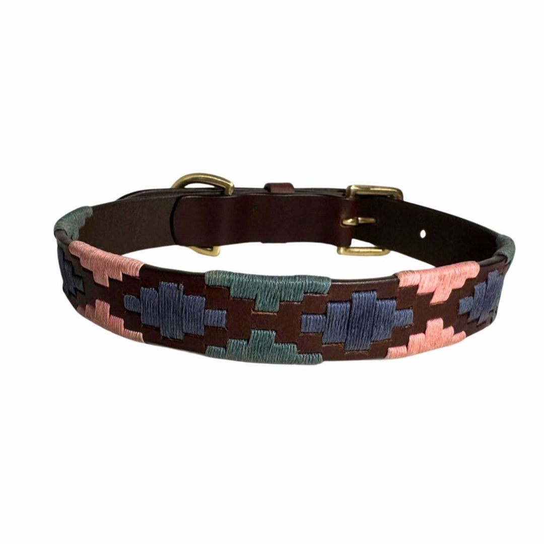 Introducing the Georgie Paws Polo Lead - Annabel: a handcrafted leather dog lead with a brass fastener, adorned with vibrant embroidered geometric patterns in pink, blue, and green on a rich brown background. Laid flat on a clean white surface, this lead is completely plastic-free.