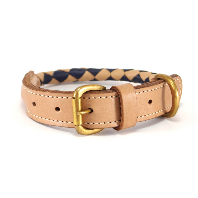 A braided navy and cream pattern embellishes this tan buffalo leather dog collar, which features a gold-tone buckle and adjustment holes for a customizable fit. The Rocket Collar navy + natural by Georgie Paws.