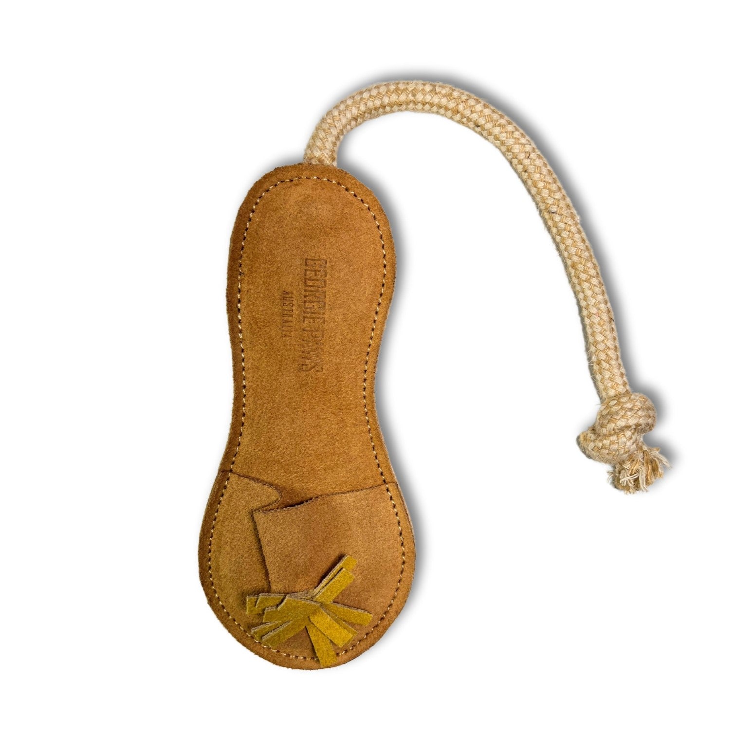 A Georgie Paws Sigrid Slipper-shaped cat toy with a cream-colored, knotted cotton rope tug attached, featuring embossed detailing and a contrasting color on the inner sole.