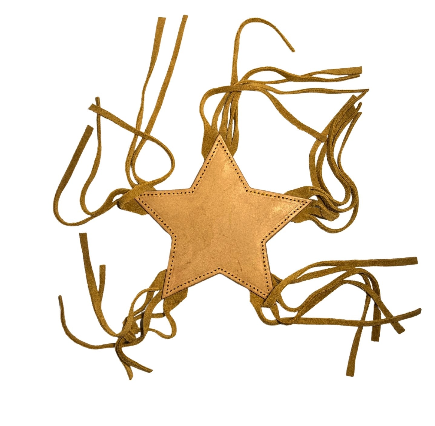 A Georgie Paws golden buffalo leather Star Teething Toy for Puppies with a texturized surface, surrounded by tangled thin leather strips, isolated on a white background.