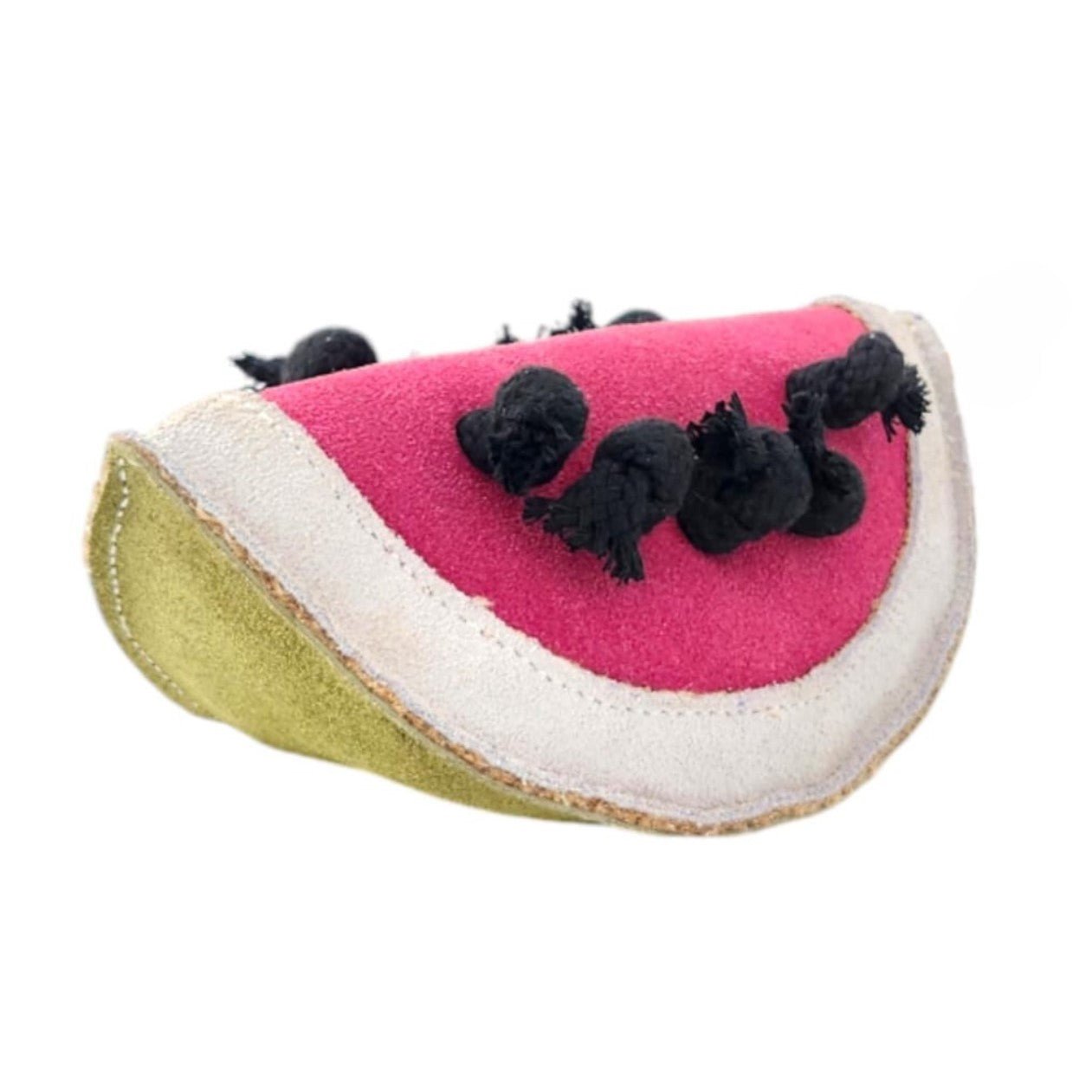 Introducing Wendy the Watermelon Dog Toy by Georgie Paws—a handmade plush toy designed in the shape of a watermelon slice. It features a vibrant green rind, a white inner edge, and a bright pink interior with black knots that mimic seeds on its soft fabric surface. Visible stitching adds extra charm, and it’s crafted from natural materials to ensure a gentle touch for your pup.