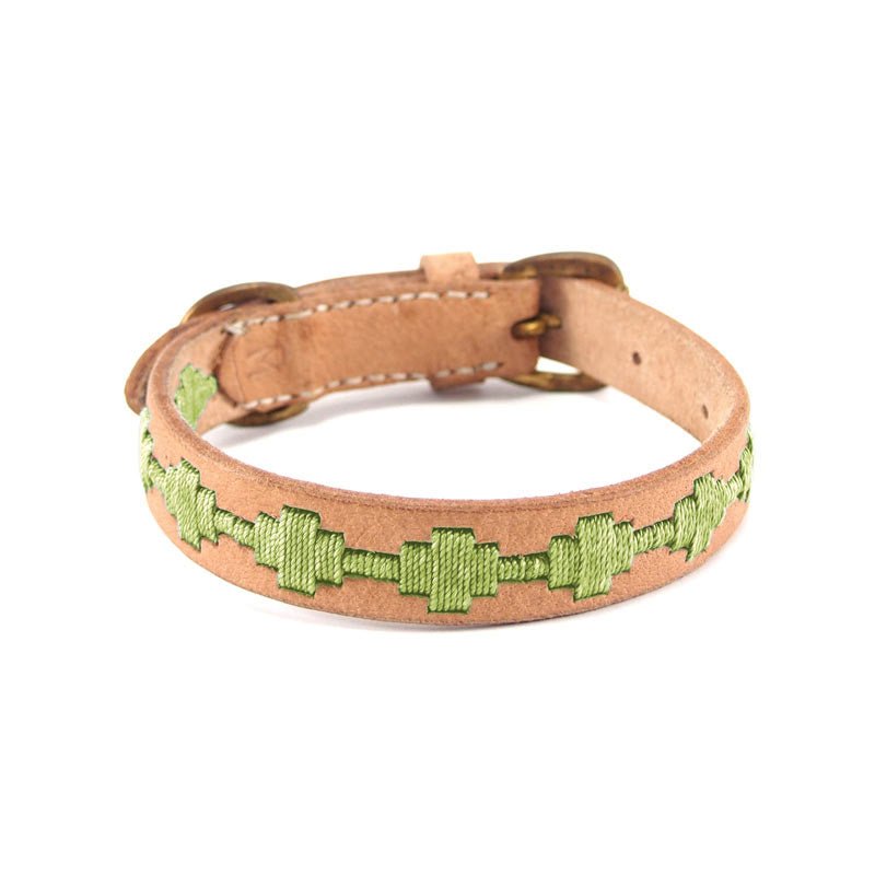 Introducing the Ethel Collar - Pear by Georgie Paws: a natural, handmade tan leather collar adorned with a green geometric embroidered pattern down the center and finished with metal buckle hardware. Displayed against a white background.