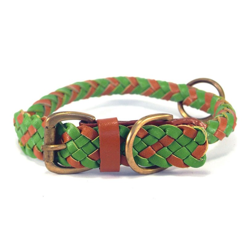 Introducing the Tonto Collar - Green by Georgie Paws: expertly handcrafted from strips of natural green and brown vegetable-tanned buffalo leather, this collar is braided into a distinctive woven pattern and finished with sturdy brass buckles and rings. Its looped design offers a stylish yet durable accessory for your pet.